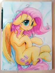 Size: 3456x4608 | Tagged: safe, artist:alcor, derpibooru import, fluttershy, pegasus, pony, semi-anthro, :o, alcor is trying to murder us, blushing, cheek fluff, chest fluff, cute, daaaaaaaaaaaw, eyelashes, female, floppy ears, fluffy, high res, hnnng, hoof fluff, leg fluff, looking at you, lying down, mare, messy mane, neck fluff, open mouth, shoulder fluff, shyabetes, side, signature, solo, traditional art, wing fluff, wings