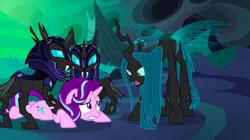 Size: 1440x809 | Tagged: armor, changeling, changeling guard, changeling hive, changeling queen, derpibooru import, disguise, disguised changeling, fake starlight glimmer, female, helmet, queen chrysalis, safe, screencap, starlight glimmer, thorax, to where and back again