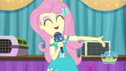 Size: 1920x1080 | Tagged: safe, derpibooru import, screencap, fluttershy, best in show: the pre-show, equestria girls, equestria girls series, spoiler:eqg series (season 2), eyes closed, eyeshadow, geode of fauna, magical geodes, makeup, microphone