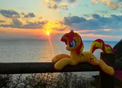 Size: 1984x1440 | Tagged: safe, artist:hihin1993, derpibooru import, sunset shimmer, pony, unicorn, female, irl, japan, mare, ocean, photo, plushie, smiling, solo, sun, sunset, sunshine shimmer