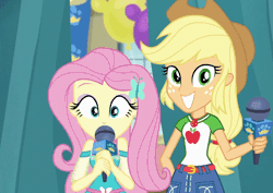 Size: 800x567 | Tagged: safe, derpibooru import, edit, edited screencap, screencap, applejack, fluttershy, best in show: the pre-show, equestria girls, equestria girls series, spoiler:eqg series (season 2), animated, cropped, geode of fauna, geode of super strength, gif, grin, magical geodes, microphone, reversed, smiling