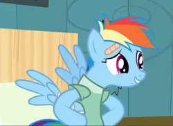 Size: 931x676 | Tagged: safe, derpibooru import, screencap, rainbow dash, pegasus, pony, read it and weep, bandage, cropped, female, grin, hooves on hips, hospital gown, mare, messy mane, nervous, nervous grin, smiling, solo