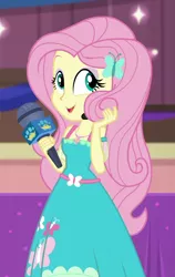 Size: 594x939 | Tagged: safe, derpibooru import, screencap, fluttershy, best in show: the victory lap, equestria girls, equestria girls series, spoiler:eqg series (season 2), beautiful, cropped, cute, geode of fauna, magical geodes, microphone, playing with hair, shyabetes, smiling