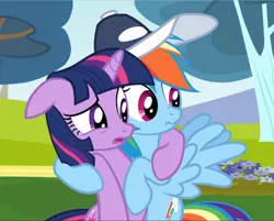 Size: 1167x939 | Tagged: safe, derpibooru import, screencap, rainbow dash, twilight sparkle, pegasus, pony, unicorn, hurricane fluttershy, coach rainbow dash, cropped, duo, female, floppy ears, hat, holding each other, mare, open mouth, scrunchy face, spread wings, unicorn twilight, wings