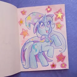 Size: 540x540 | Tagged: safe, artist:spunky-sparkle, derpibooru import, trixie, pony, unicorn, cape, clothes, colored pencil drawing, female, hat, mare, photo, soft color, solo, stars, traditional art, trixie's cape, trixie's hat, wizard hat