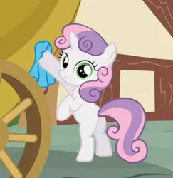 Size: 708x727 | Tagged: safe, derpibooru import, screencap, sweetie belle, pony, unicorn, one bad apple, bipedal, cropped, female, filly, holding, looking at you, looking back, rag, raised hoof, smiling, solo, washcloth, wiping