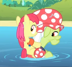 Size: 790x735 | Tagged: safe, derpibooru import, screencap, apple bloom, granny smith, earth pony, pony, leap of faith, adorabloom, bow, cropped, cute, elderly, female, filly, floppy ears, hair bow, hat, looking back, piggyback ride, smiling, swimming, swimming cap, swimming hole, wet