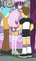 Size: 167x284 | Tagged: safe, derpibooru import, screencap, bright idea, fleur-de-lis, teddy t. touchdown, display of affection, equestria girls, equestria girls series, background human, clothes, cropped, female, male, pants, rear view, shoes, shorts, socks