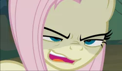 Size: 1606x939 | Tagged: safe, derpibooru import, screencap, mean fluttershy, pony, the mean 6, clone, close-up, crazy face, creepy, evil grin, face of mercy, faic, grin, smiling, solo