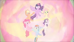 Size: 1747x983 | Tagged: safe, derpibooru import, screencap, applejack, fluttershy, pinkie pie, rainbow dash, rarity, twilight sparkle, twilight sparkle (alicorn), alicorn, earth pony, pegasus, pony, unicorn, the beginning of the end, cropped, ethereal mane, female, floating, glowing eyes, glowing horn, holding hooves, horn, light, magic, magic of friendship, mane six, mare, smiling, spread wings, wings