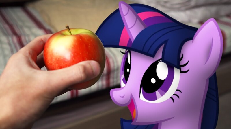 Size: 1280x720 | Tagged: safe, artist:stormxf3, derpibooru import, twilight sparkle, pony, apple, blanket, food, irl, photo, ponies in real life, smiling