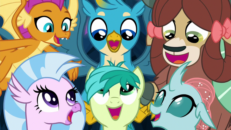Size: 1280x720 | Tagged: safe, derpibooru import, screencap, gallus, ocellus, sandbar, silverstream, smolder, yona, changedling, changeling, dragon, earth pony, gryphon, hippogriff, pony, yak, uprooted, dragoness, female, happy, male, singing, student six, the place where we belong