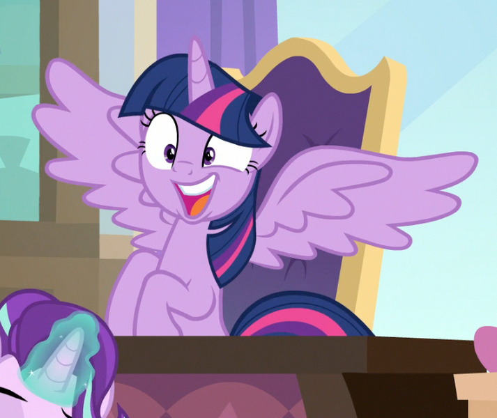 Size: 741x624 | Tagged: safe, derpibooru import, screencap, starlight glimmer, twilight sparkle, twilight sparkle (alicorn), alicorn, pony, unicorn, sparkle's seven, cropped, desk, excited, faic, female, gasp, glowing horn, horn, magic, mare, offscreen character, open mouth, sitting, solo focus, spread wings, wide eyes, wings