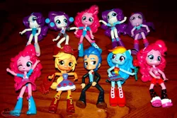 Size: 1024x683 | Tagged: safe, derpibooru import, flash sentry, pinkie pie, rainbow dash, rarity, twilight sparkle, equestria girls, clothes, doll, equestria girls minis, minis, my little pony, style, table, toy, wood