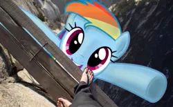 Size: 403x250 | Tagged: safe, derpibooru import, rainbow dash, human, pony, bridge, falling, irl, legs, macro, photo, ponies in real life, rock, this will end in vore