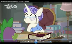 Size: 843x520 | Tagged: safe, derpibooru import, screencap, first folio, spike, dragon, unicorn, the point of no return, book, canterlot library, clothes, discovery family logo, eyes closed, glasses, shirt, smiling, solo focus, table, windows media player, winged spike