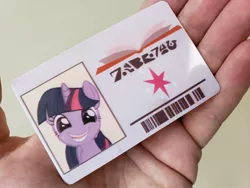 Size: 2048x1536 | Tagged: safe, artist:sky-railroad, derpibooru import, twilight sparkle, pony, the point of no return, barcode, cutie mark, defictionalization, library card, real life background, smiling, solo, that was fast, written equestrian