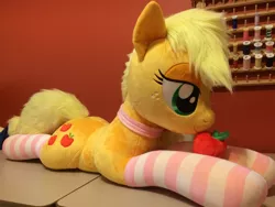 Size: 2448x1836 | Tagged: safe, artist:qtpony, derpibooru import, applejack, pony, apple, choker, clothes, food, irl, photo, plushie, prone, socks, solo, striped socks