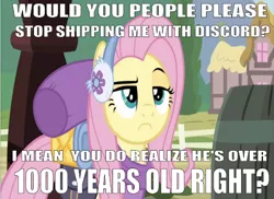 Size: 670x489 | Tagged: safe, derpibooru import, edit, edited screencap, editor:undeadponysoldier, screencap, fluttershy, pegasus, pony, dungeons and discords, barrel, downvote bait, earmuffs, female, hate, implied discord, implied discoshy, implied shipping, implied straight, mare, mouthpiece, op started shit, ponyville, question mark, raised eyebrow, shipping denied, solo, talking to viewer, unamused, wrong aspect ratio