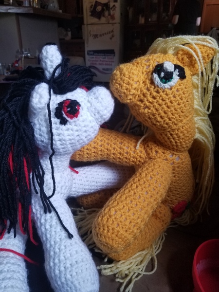 Size: 3024x4032 | Tagged: safe, artist:felistormsstudio, derpibooru import, applejack, oc, oc:blackjack, pony, fallout equestria, fallout equestria: project horizons, crochet, fanfic art, kissing, plushie, smooch