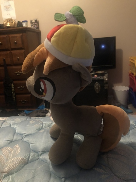 Size: 3024x4032 | Tagged: safe, artist:undeadponysoldier, derpibooru import, photographer:undeadponysoldier, button mash, pony, bed, colt, drawer, foal, hat, irl, male, photo, plushie, solo, television, trash can