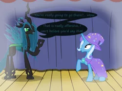 Size: 1280x957 | Tagged: safe, artist:evil-dec0y, derpibooru import, queen chrysalis, trixie, changeling, changeling queen, pony, unicorn, comic:trixie vs., cape, clothes, duo, duo female, female, hat, imagine spot, mare, raised hoof, stage, trixie's cape, trixie's hat