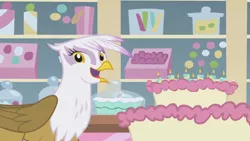 Size: 1366x768 | Tagged: cake, derpibooru import, food, gilda, griffon the brush off, happy, safe, screencap, smiling, solo, when she smiles