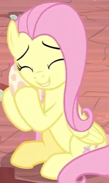 Size: 224x375 | Tagged: safe, derpibooru import, screencap, fluttershy, pegasus, pony, sweet and smoky, cropped, cute, egg, female, fluttermom, hug, mama fluttershy, mare, shyabetes