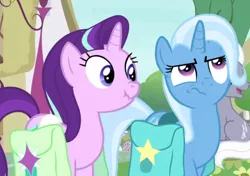 Size: 1136x798 | Tagged: safe, derpibooru import, screencap, royal riff, starlight glimmer, trixie, pony, student counsel, bag, saddle bag, scrunchy face, trixie is not amused, unamused