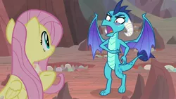 Size: 1920x1080 | Tagged: safe, derpibooru import, screencap, fluttershy, princess ember, dragon, pegasus, pony, sweet and smoky, blush sticker, blushing, claws, dragon egg, dragoness, egg, embarrassed, female, horns, mare, open mouth, smiling, spread wings, tsundember, tsundere, underhoof, wings
