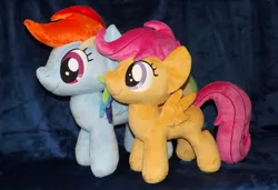 Size: 1280x875 | Tagged: safe, artist:peruserofpieces, derpibooru import, rainbow dash, scootaloo, pegasus, pony, comparison, duo, female, filly, happy, irl, mare, photo, plushie, profile, side by side, smiling, toy, wings