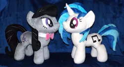 Size: 1280x695 | Tagged: safe, artist:peruserofpieces, derpibooru import, octavia melody, vinyl scratch, earth pony, pony, unicorn, bow, bowtie, duo, facing each other, female, implied lesbian, implied scratchtavia, implied shipping, irl, mare, necktie, photo, plushie, profile, smiling, toy