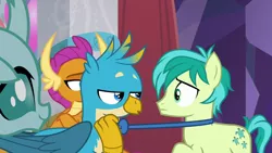 Size: 1280x720 | Tagged: safe, derpibooru import, screencap, gallus, ocellus, sandbar, smolder, changedling, changeling, dragon, gryphon, pony, she's all yak, amused, bowtie, claws, confused, crossed arms, curved horn, cute, cutie mark, diaocelles, dragoness, female, folded wings, frown, head feathers, horn, horns, lidded eyes, male, obscured face, out of context, pulling, smiling, talking, talons, teasing, teenaged dragon, teenager, wings