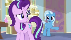 Size: 1920x1080 | Tagged: safe, derpibooru import, screencap, starlight glimmer, trixie, pony, unicorn, student counsel, book, cute, duo, female, mare, raised eyebrow, raised hoof, school of friendship, starlight's office