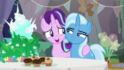 Size: 1920x1080 | Tagged: safe, derpibooru import, screencap, starlight glimmer, trixie, pony, student counsel, balloon, cake, cupcake, equinox cake, food, hug