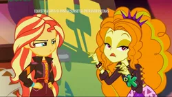 Size: 1920x1080 | Tagged: safe, derpibooru import, screencap, adagio dazzle, sunset shimmer, equestria girls, equestria girls series, sunset's backstage pass!, spoiler:eqg series (season 2), clothes, discovery kids, hand on hip, music festival outfit, spanish