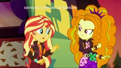 Size: 1920x1080 | Tagged: safe, derpibooru import, screencap, adagio dazzle, sunset shimmer, equestria girls, equestria girls series, sunset's backstage pass!, spoiler:eqg series (season 2), discovery kids, music festival outfit, spanish
