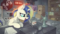 Size: 2400x1350 | Tagged: safe, artist:darksittich, derpibooru import, oc, oc:cinnamon cider, unofficial characters only, pony, unicorn, fallout equestria, audio equipment, brony radio germany, cardboard box, fan, freckles, male, microphone, mug, on air, solo, sparkle cola, trap