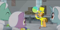 Size: 645x329 | Tagged: safe, derpibooru import, screencap, cheese sandwich, earth pony, pony, unicorn, the last laugh, balloon, beach ball, box, clothes, early, factory, hat, needle, song, summer, yellow
