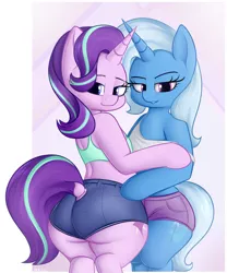 Size: 1800x2160 | Tagged: suggestive, artist:andelai, derpibooru import, starlight glimmer, trixie, semi-anthro, unicorn, ass, bedroom eyes, bipedal, booty shorts, bra, butt, clothes, cute, cutie mark, dock, female, females only, glimmer glutes, high res, human shoulders, large butt, lesbian, looking at you, plot, shipping, shorts, simple background, smiling, standing, startrix, tanktop, the ass was fat, tight clothing, underwear