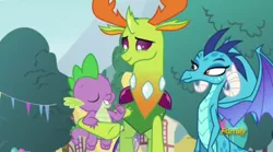 Size: 500x278 | Tagged: changedling, changeling, cute, derpibooru import, discovery family logo, dragon, eyes closed, female, hug, king thorax, male, princess ember, safe, screencap, smiling, spike, spikelove, spread wings, thorax, triple threat, wings
