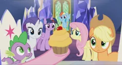 Size: 1600x864 | Tagged: alicorn, animation error, applejack, cupcake, cute, derpibooru import, dragon, fluttershy, food, hoof hold, long neck, mane six, pinkie pie, pinkie's hoof, rainbow dash, rarity, safe, screencap, spike, the last laugh, throne, throne room, twilight's castle, twilight sparkle, twilight sparkle (alicorn), winged spike