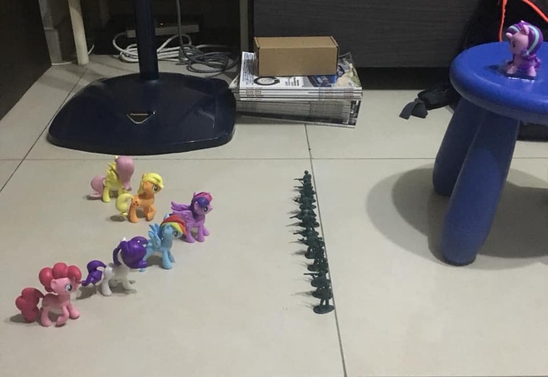 Size: 960x660 | Tagged: safe, derpibooru import, photographer:henrychan, applejack, fluttershy, pinkie pie, rainbow dash, rarity, starlight glimmer, twilight sparkle, twilight sparkle (alicorn), alicorn, earth pony, human, pegasus, pony, unicorn, 2019 hong kong protests, china, cutie mark crew, hong kong, imminent assimilation, irl, mane six, photo, soldier, toy, toy soldier, welcome to the herd