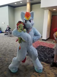 Size: 1536x2048 | Tagged: artist:dolphinaphinity, bronycon, bronycon 2019, derpibooru import, fursuit, human, irl, irl human, photo, photographer:weedhorselmao, plushie, rainbow dash, safe, tree hugger