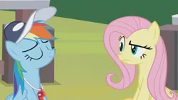 Size: 1366x768 | Tagged: safe, derpibooru import, screencap, fluttershy, rainbow dash, pegasus, pony, 2 4 6 greaaat, cap, coach, coach rainbow dash, duo, eyes closed, female, folded wings, frown, hat, mare, raised eyebrow, sarcastic, skeptical, smiling, smirk, smug, whistle, wings