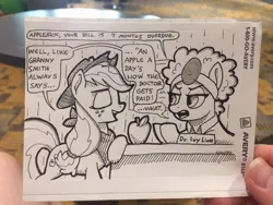 Size: 640x480 | Tagged: safe, artist:docwario, derpibooru import, applejack, oc, earth pony, pony, apple, dialogue, doctor, female, food, head mirror, mare, monochrome, photo, sticker, traditional art