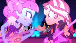 Size: 1916x1080 | Tagged: safe, derpibooru import, screencap, curly winds, kiwi lollipop, lemon zack, sandalwood, some blue guy, sunset shimmer, track starr, equestria girls, equestria girls series, sunset's backstage pass!, spoiler:eqg series (season 2), background human, concert, duo, duo female, electric guitar, female, glowstick, guitar, k-lo, looking at each other, male, musical instrument, true original (song)