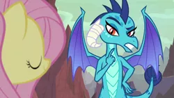 Size: 1920x1080 | Tagged: safe, derpibooru import, screencap, fluttershy, princess ember, dragon, pony, sweet and smoky, dragoness, female, mare, pointing, pointing at self, solo focus