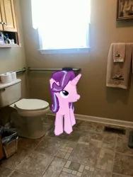 Size: 3024x4032 | Tagged: safe, derpibooru import, photographer:undeadponysoldier, starlight glimmer, pony, unicorn, augmented reality, bathroom, but why, female, gameloft, irl, mare, photo, ponies in real life, toilet, towel, trash can