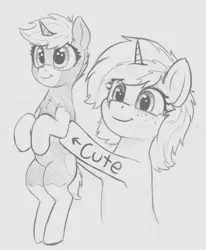 Size: 538x652 | Tagged: safe, artist:zippysqrl, derpibooru import, oc, oc:nootaz, oc:sign, unofficial characters only, pony, unicorn, body writing, chest fluff, cute, duo, female, freckles, grayscale, holding a pony, hoof hold, hooves up, monochrome, smiling